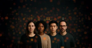 Diverse professionals in dark setting symbolize the Ideal Customer Profile vital to effective B2B marketing.